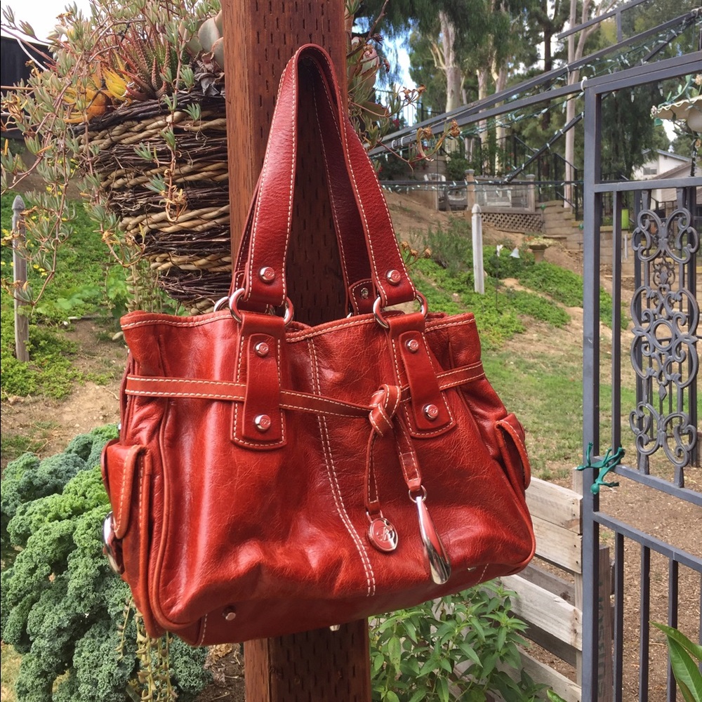 Women's handbag in brick color