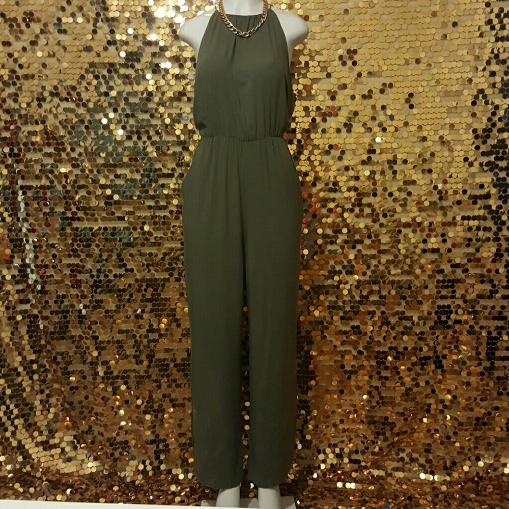 H&M olive flowy romper with open back size 12
