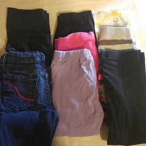 8 pairs of tights and 1 pair of jeans