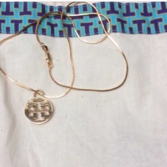 Tory Burch Jewelry - AUTH TORY BURCH PENDANT ON 14kgp chain 18” new