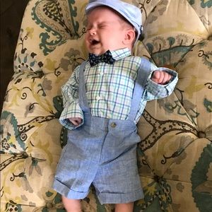 Linen suspended shorts and collared shirt.