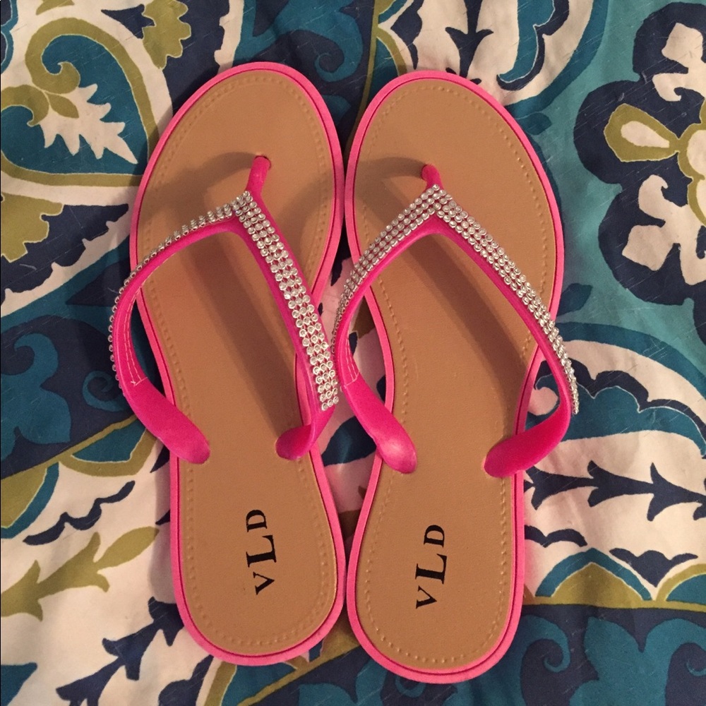 Never worn pink flip flops