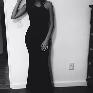 Black sleeveless scoop back halter gown