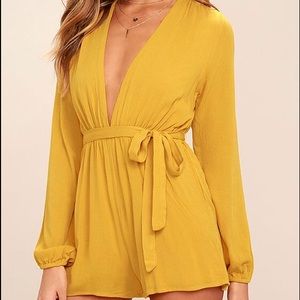 Long sleeve golden yellow romper. New with tags!!