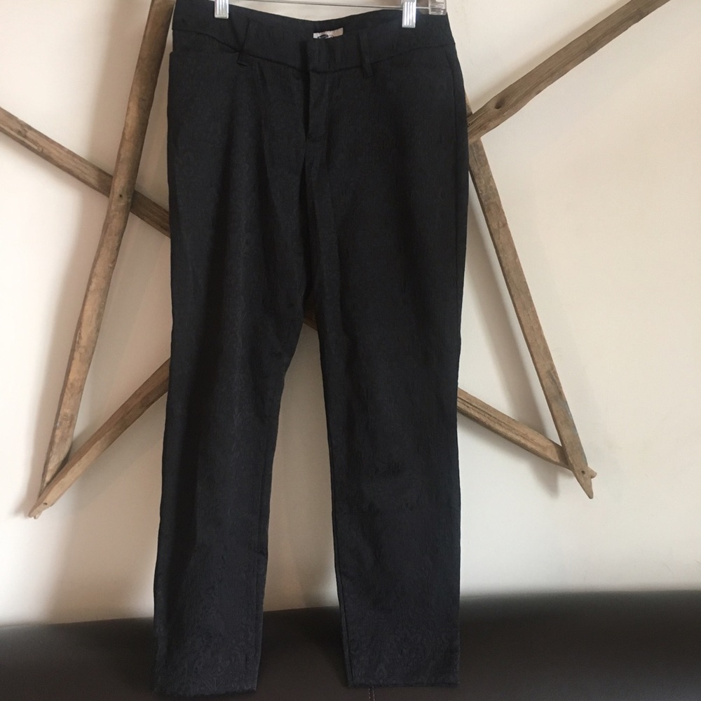 black textured skinny jeans