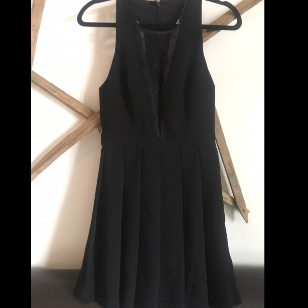 Black pleat and lace cocktail dress