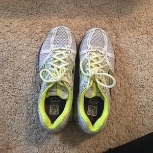 neon green/yellow and purple Brooks runnnig shoes