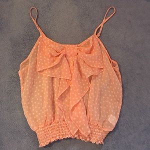 Light pink blouse with poka dots