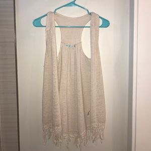 Vest with tassels on bottom