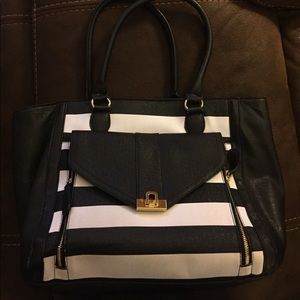 White and black striped purse