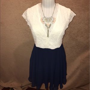 A'GACI white lace, scallop sleeve/navy dress