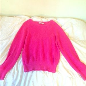 I am selling a rose pink knit sweater.