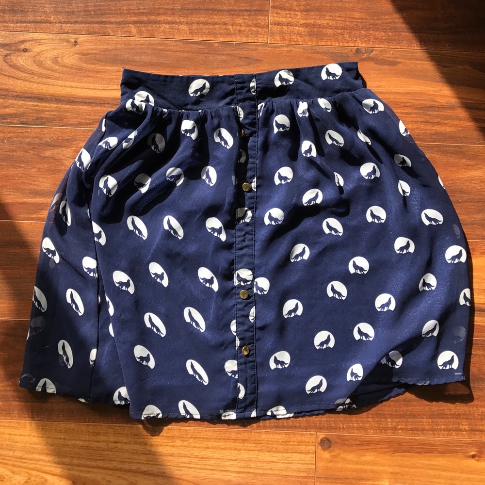 Cute blue and white skirt with wolf pattern.