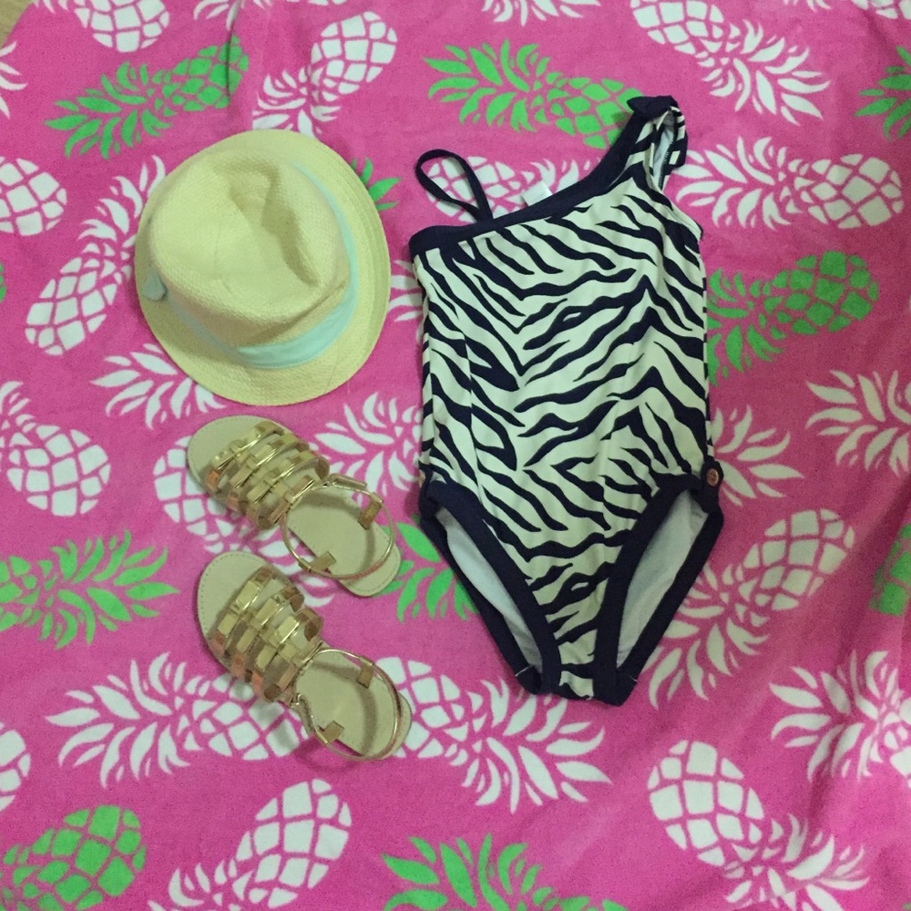 One piece swimming suit.