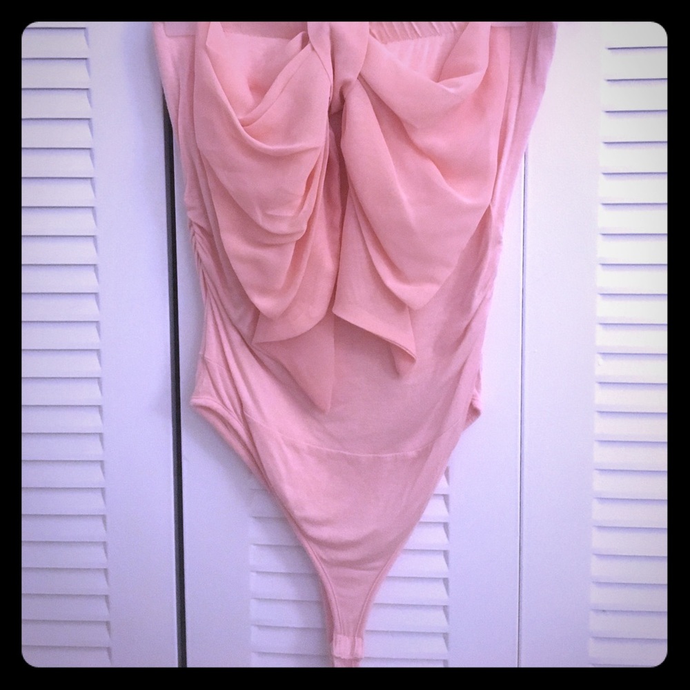 Strapless, pink Bodysuit with a bow on the front