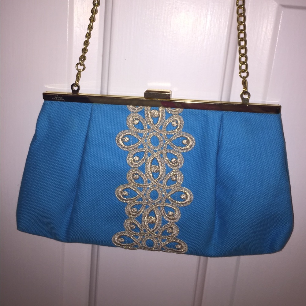 Lilly Pulitzer teal and gold clutch