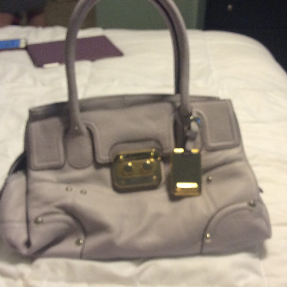 B. Makowsky Glove Leather East/West Bag.