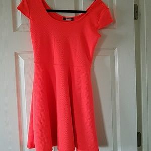 Fluorescent orange dress