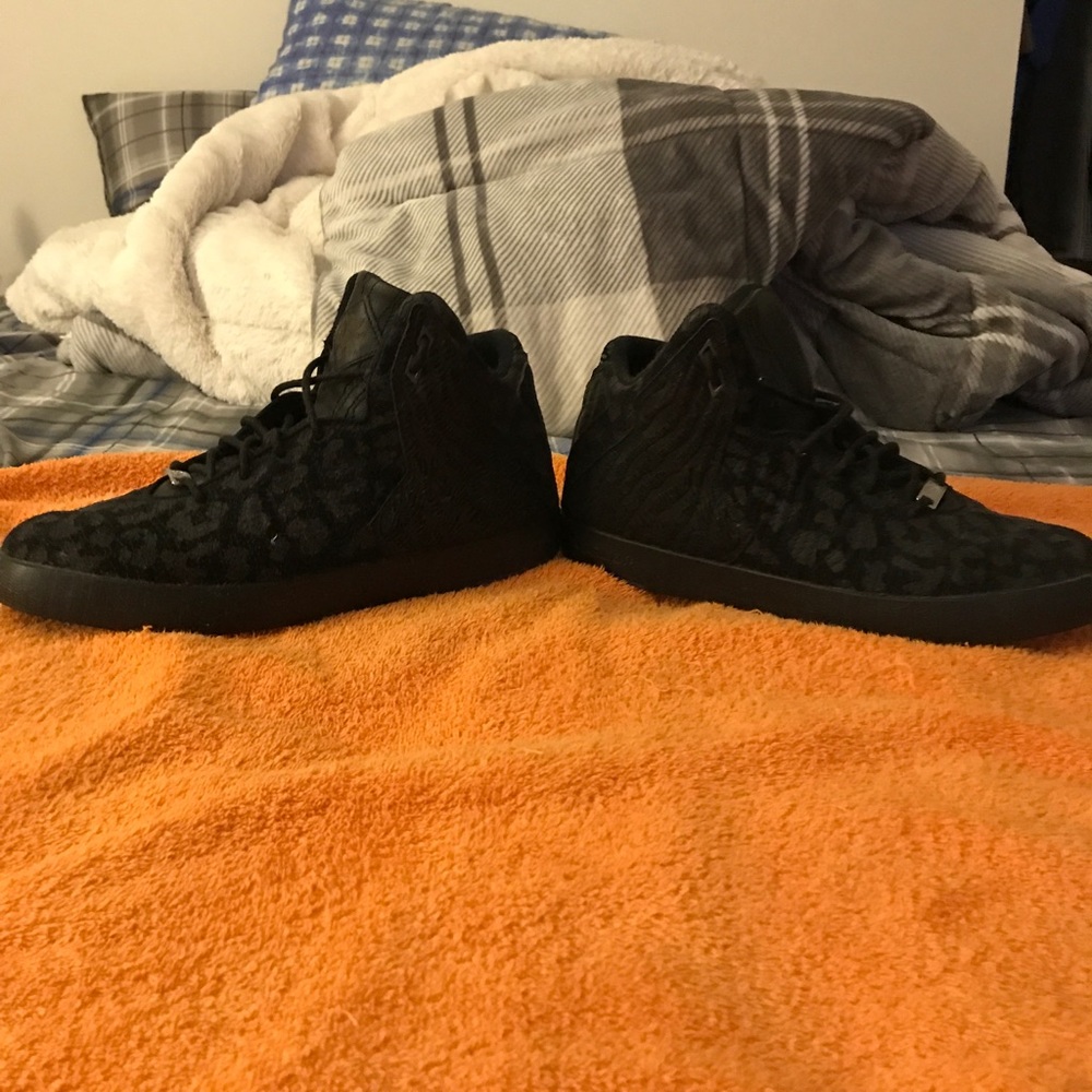 Black on black Lebron James animal print sneakers