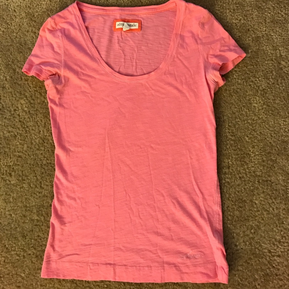 Pink scoop neck tee.