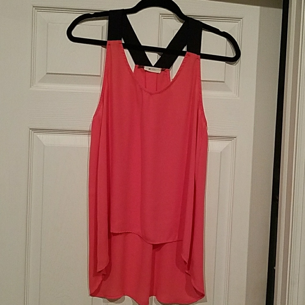 Coral color tunic with black strap shoulders