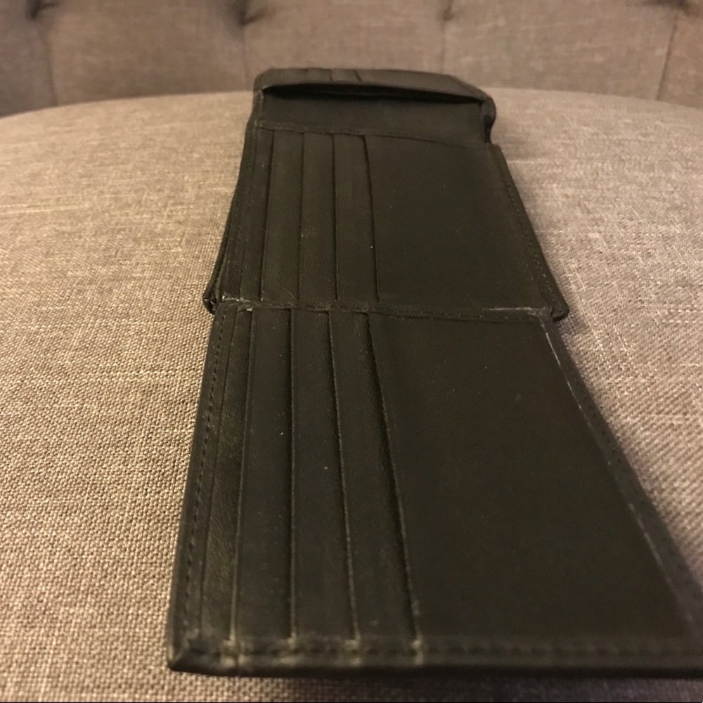 Tumi genuine leather black wallet