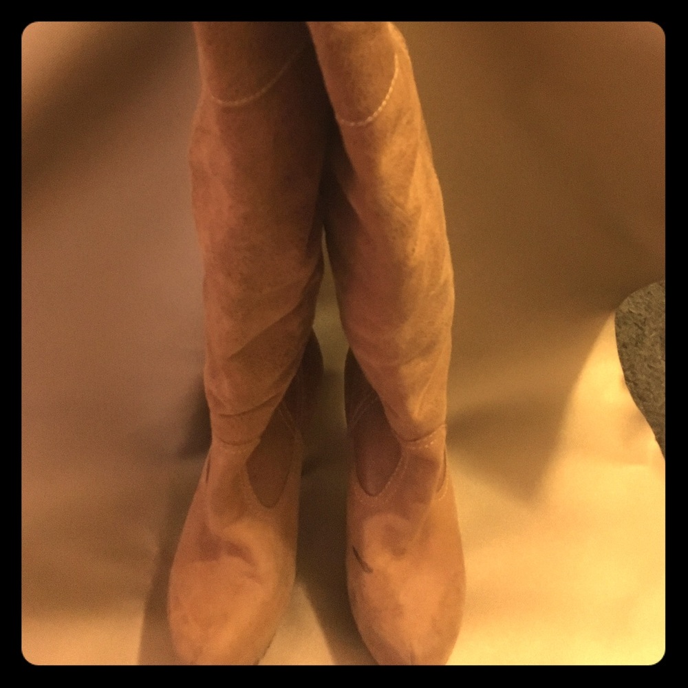 Report tan knee high boots