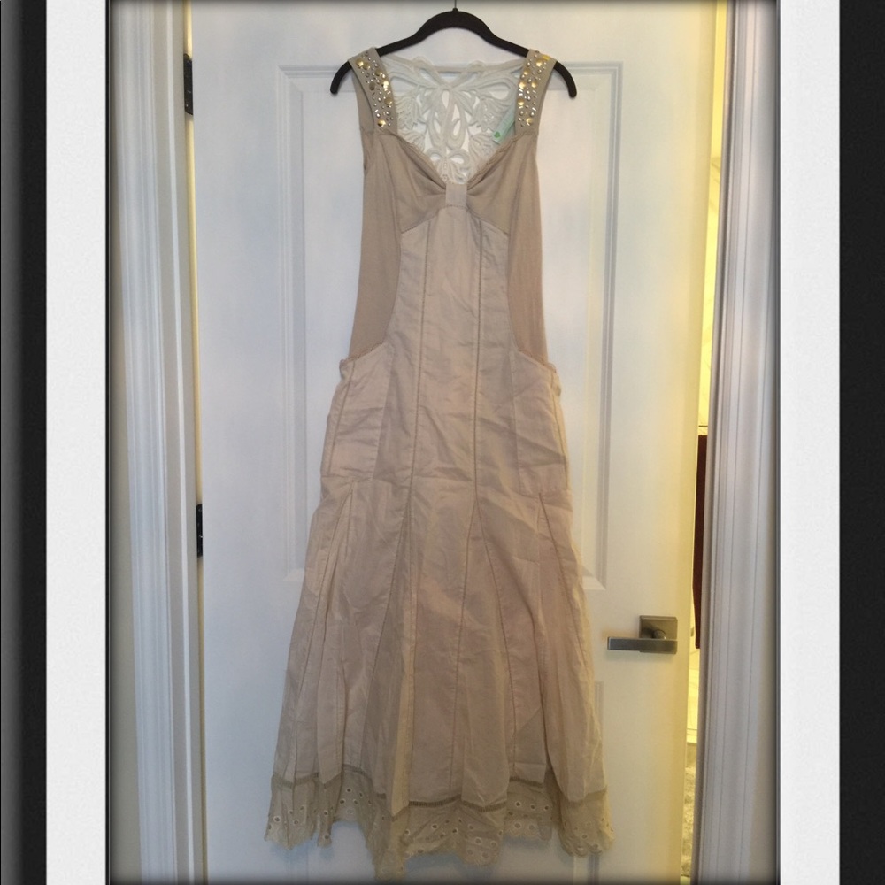 Long detailed summer dress.