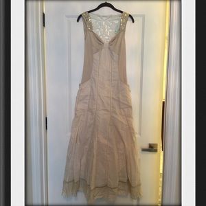 Long detailed summer dress.