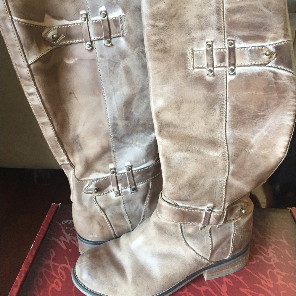 Gently used beige boots