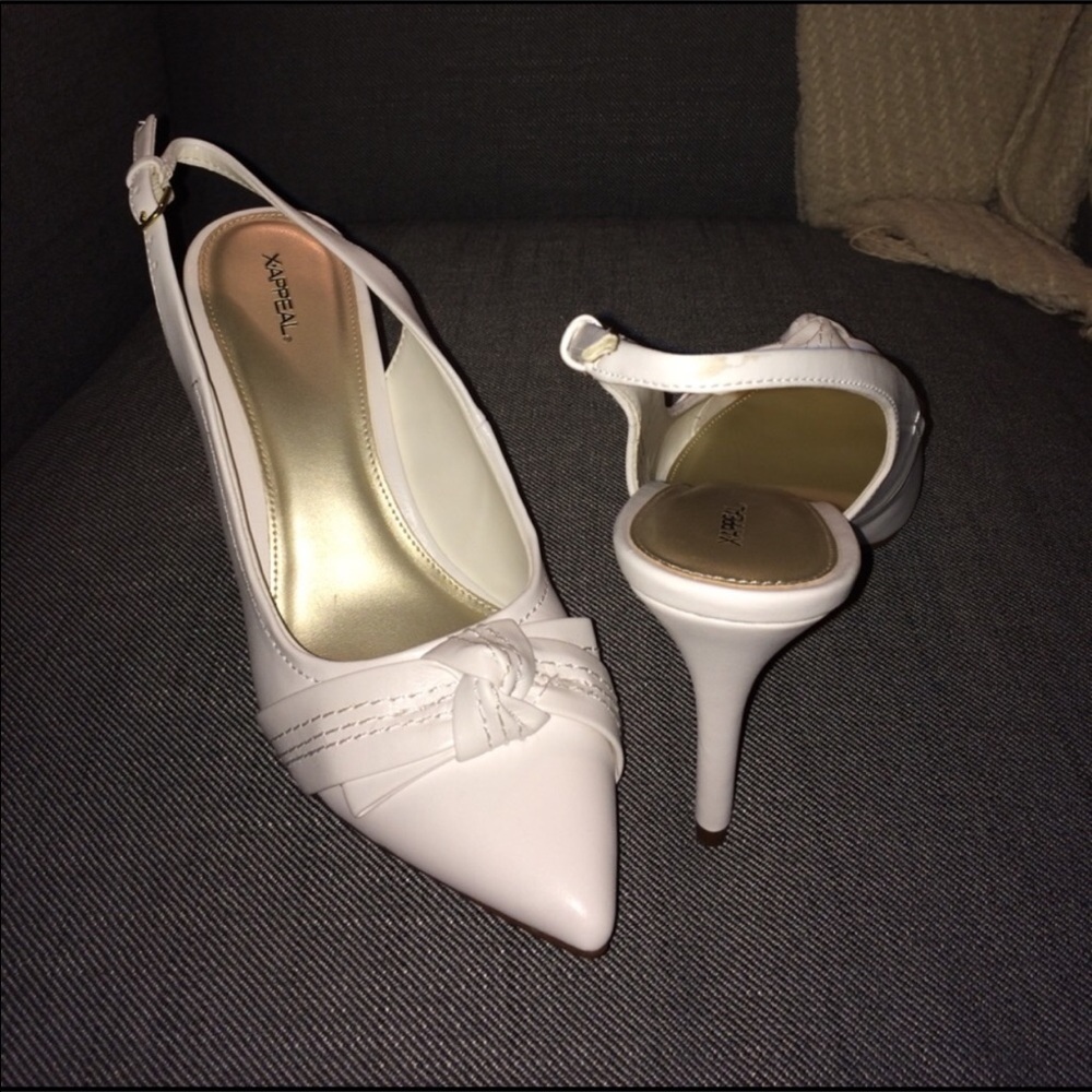 SOLD. White sling back heels
