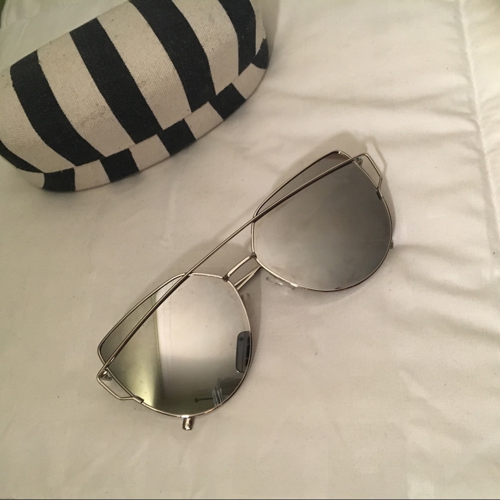 Silver sunglasses with case