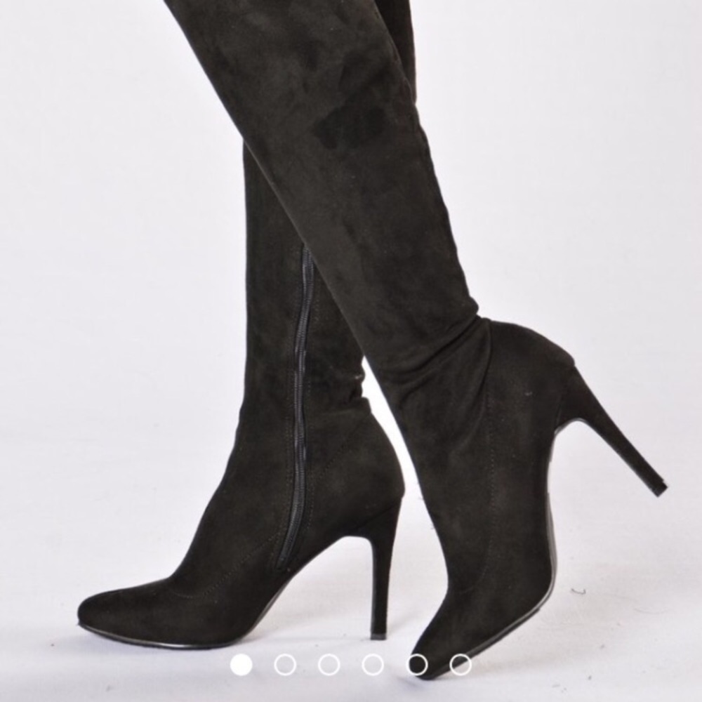 Black heel thigh high boots
