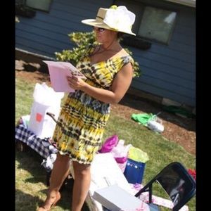 Soprano deep v, tie back dress.