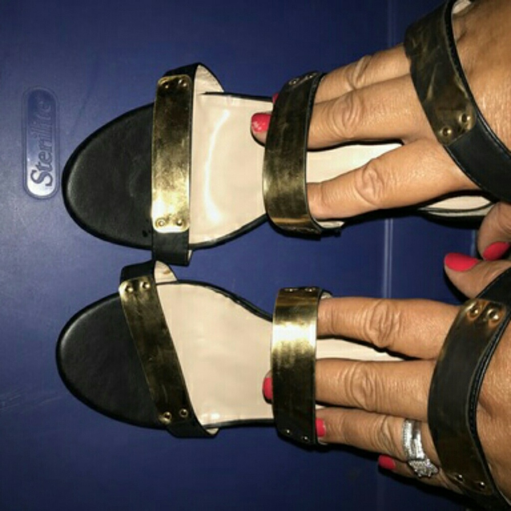 Black and gold size 12 shoes