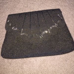 Black with gold bearing purse with optional string