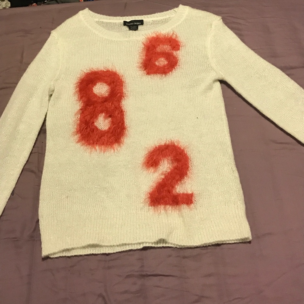 White, fuzzy sweater