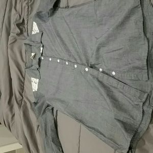 A jean 3/4 sleved shirt made out of cotton