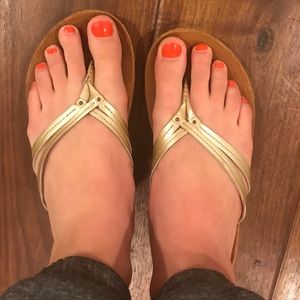 Olukai sandals with silver straps