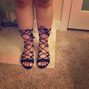 Black gladiator lace up sandals