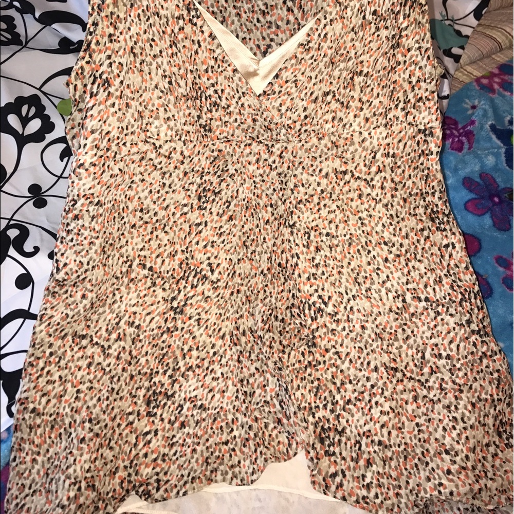Summery, flattering sleeveless top w/built-in cami