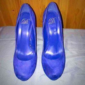 Electric Blue suede pumps.