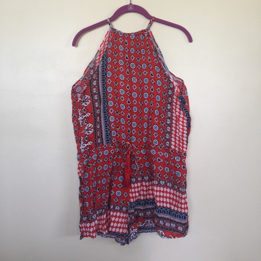 red, white, and blue patterned romper
