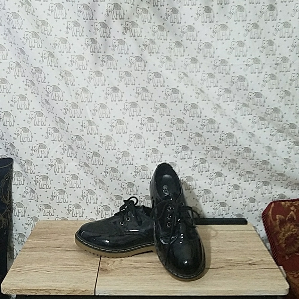 Lace up combat style shoes