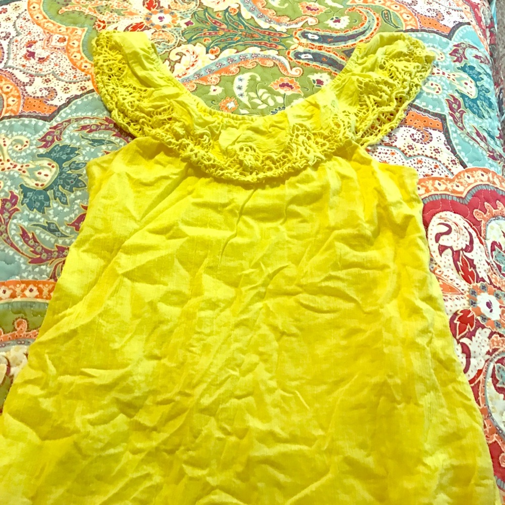 Yellow tank top on or off the shoulders