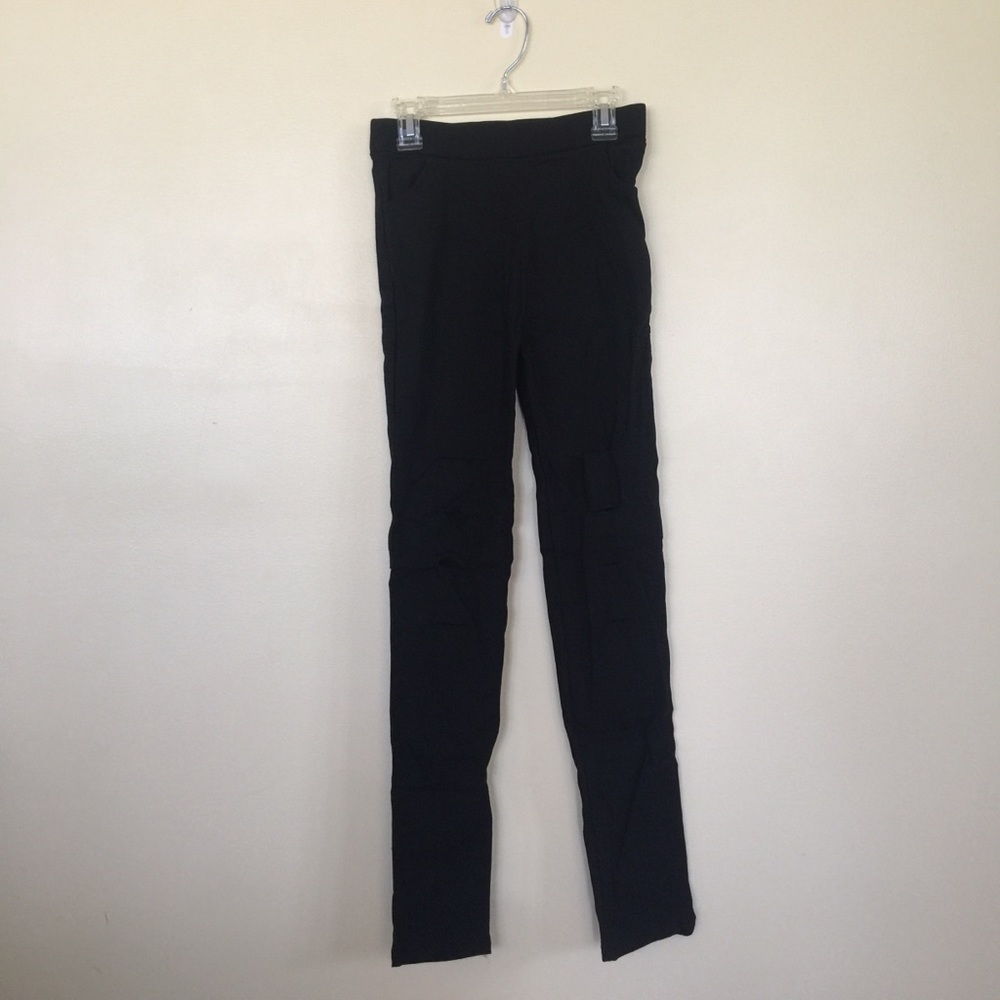 black stretchy ripped pants - similar to jeggings