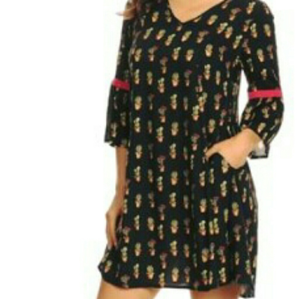 Cactus dress with pockets. One size small left!