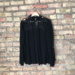 Black long sleeve lace neck flowy top.