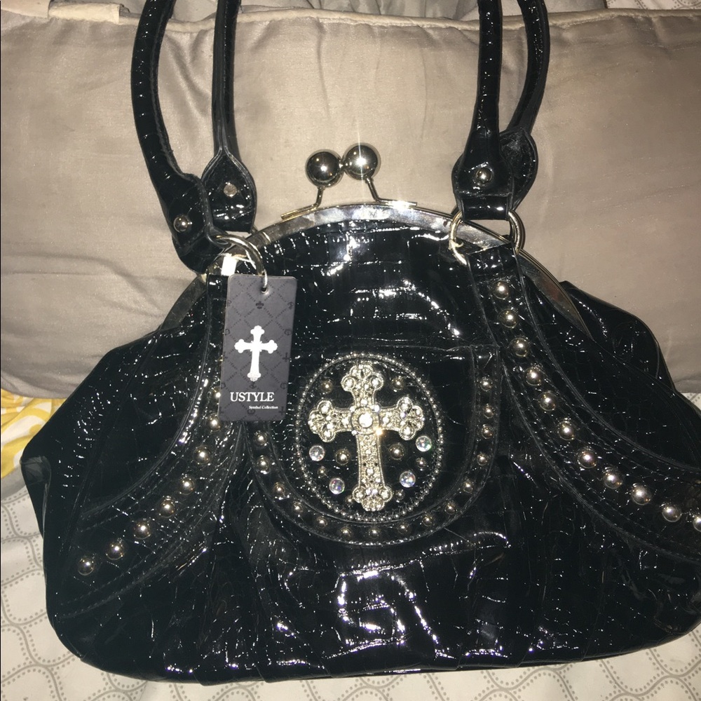 Brand new with tags clam shell style hand bag