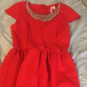 Francesca's red dress